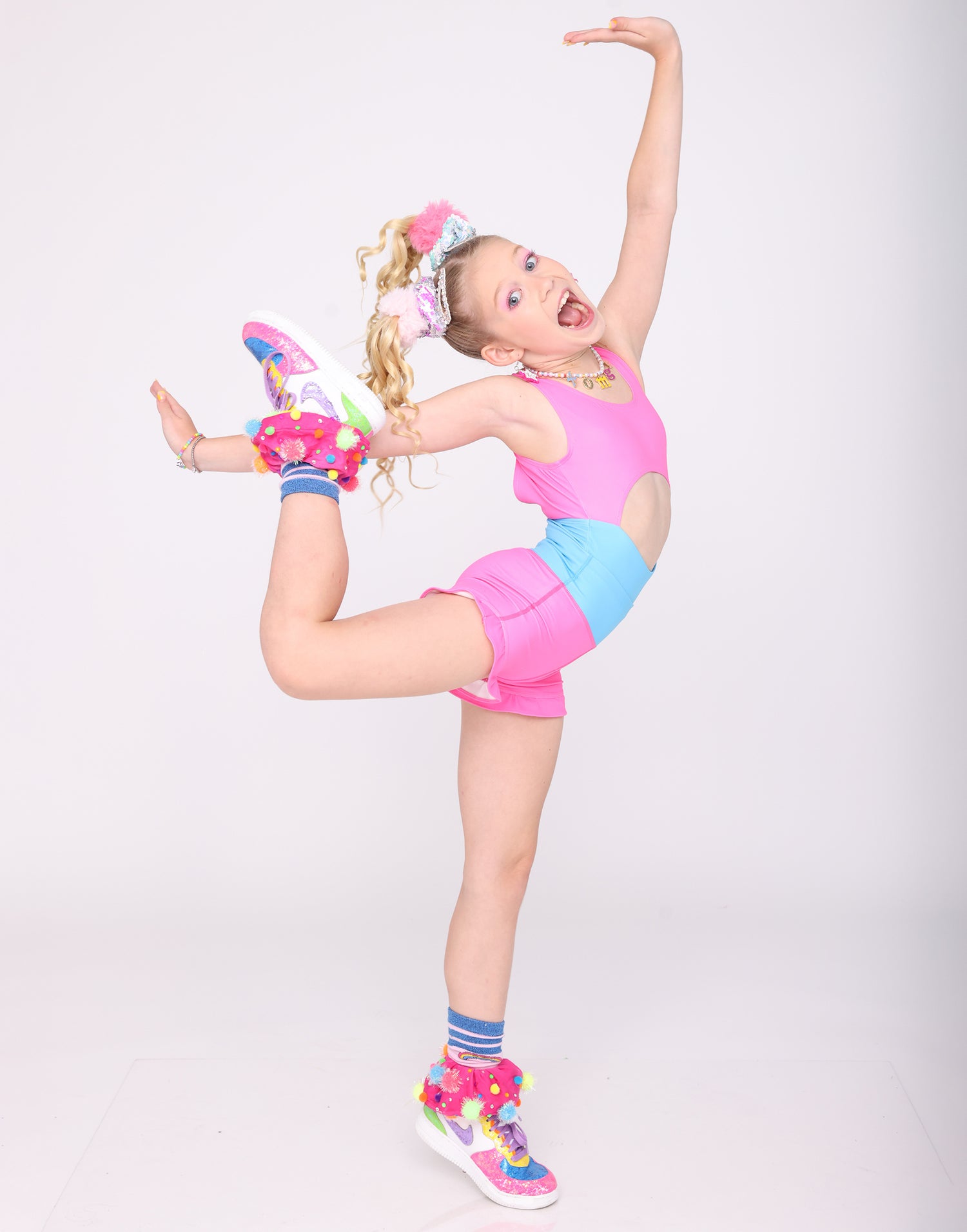 Kinley Child Active Leotard in Turquoise/Pink