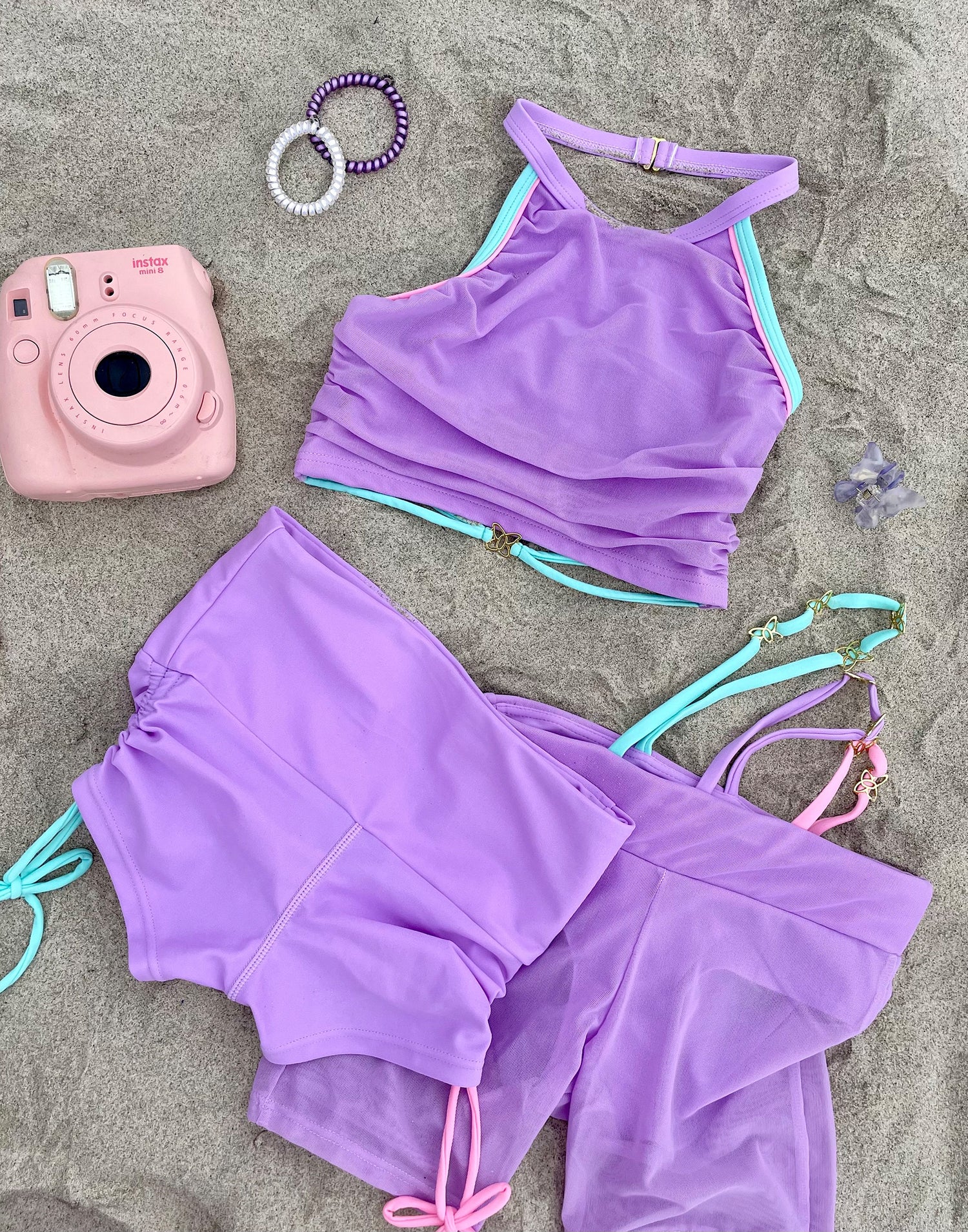 Leigha Biker Active Short in Lavender with Strappy Detailing & Gold Butterfly Trim Pieces - Product View